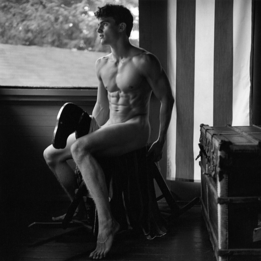 Peter Johnson on rocking horse, Camp Longwood, Adirondacks