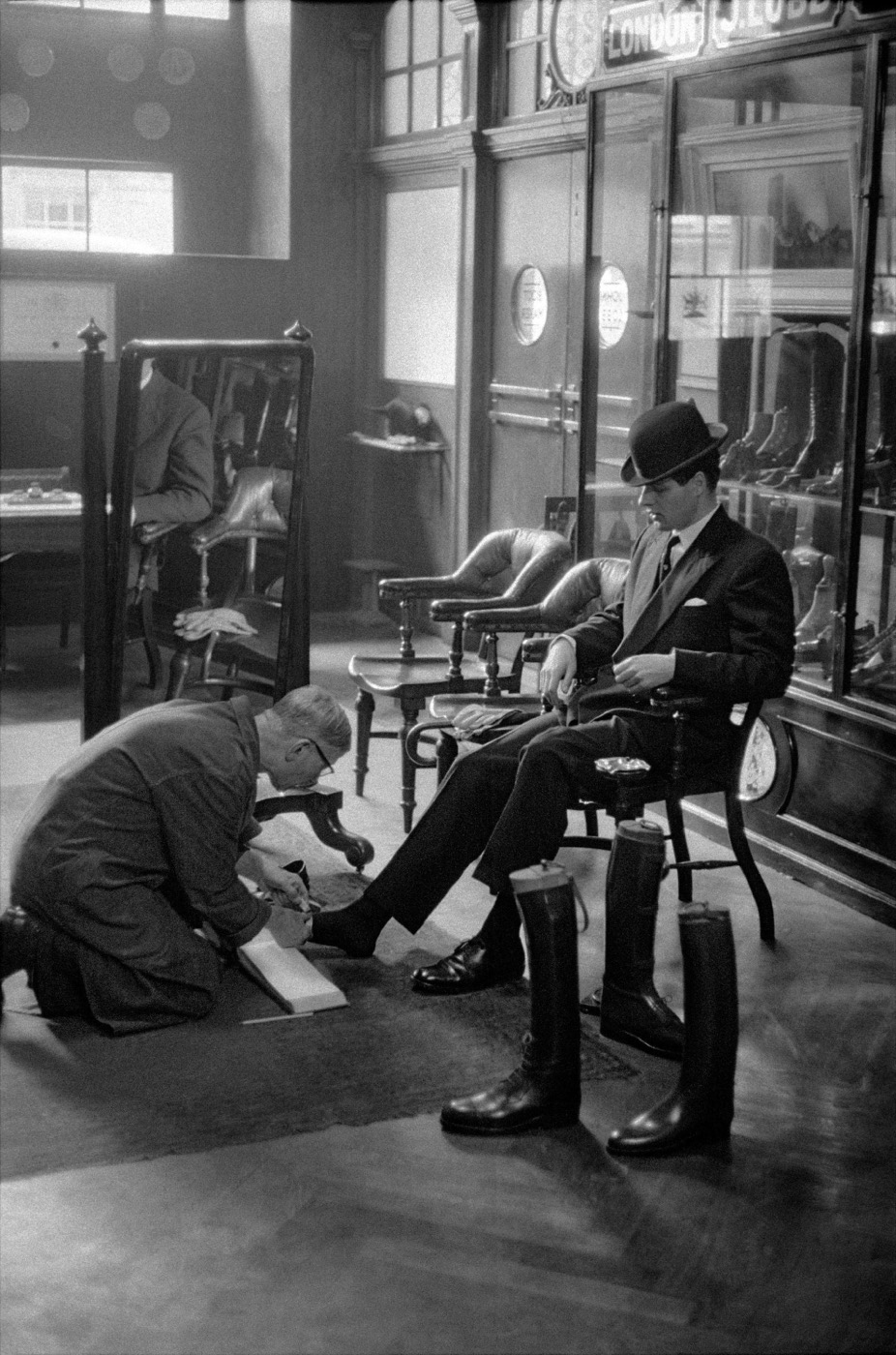 Customer at Lobb's shoe shop, London