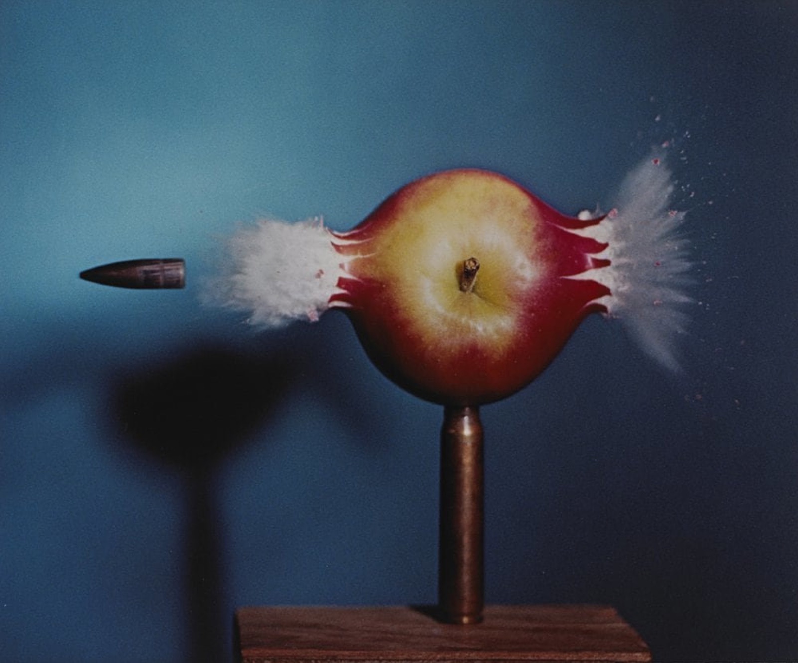 30 Caliber Bullet Piercing an Apple