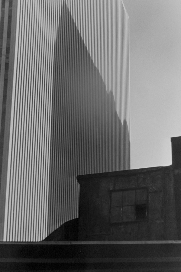 Old rooftop and new building from Broadway, Midtown, New York